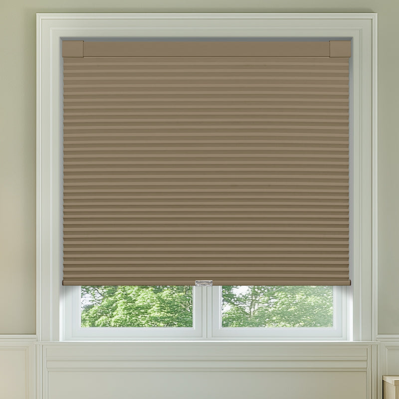 Berissa Classic No Drill Blackout Honeycomb Cellular Shades installed on a window showing a neutral color and stylish design.