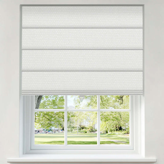 Berissa Custom Textured Blackout No Drill Quick installation Roman Shades installed in a window overlooking greenery.