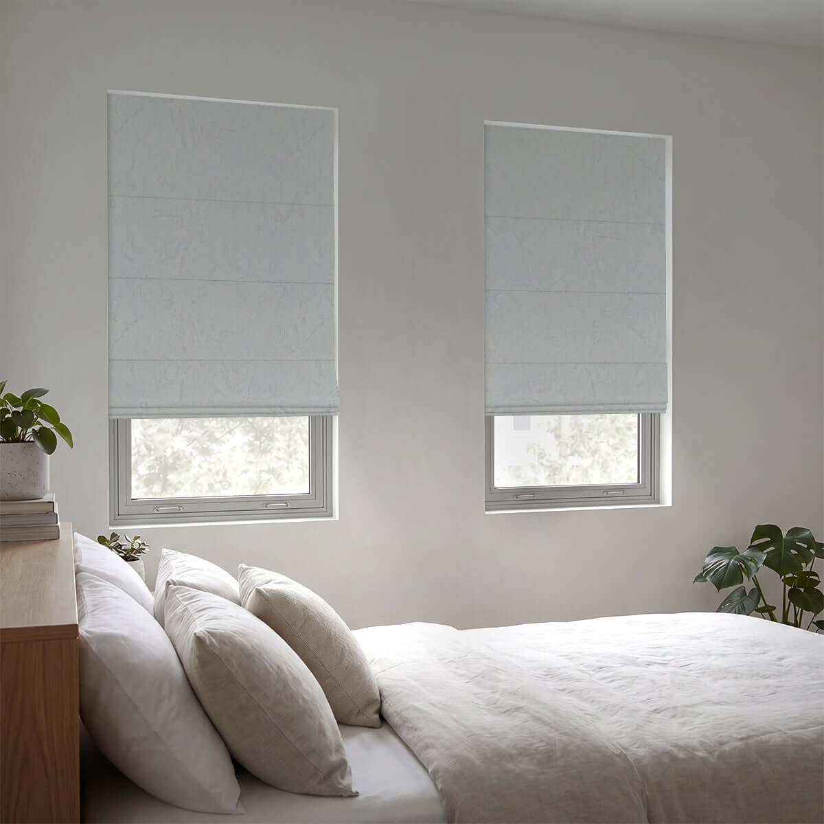 Berissa Ice Marble Texture Blackout No Tool Roman Shades adorning windows in a modern bedroom interior.