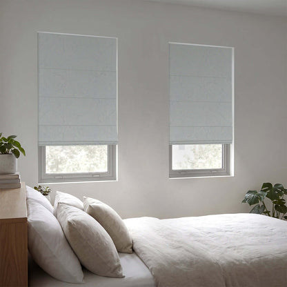 Berissa Ice Marble Texture Blackout No Tool Roman Shades adorning windows in a modern bedroom interior.
