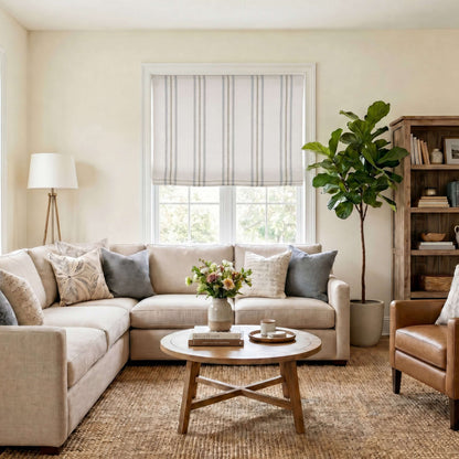 Cozy living room with Berissa No Tool Cotton Linen Cordless Relaxed Roman Shade and stylish furnishings.