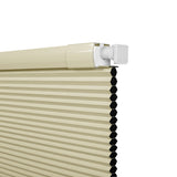 Berissa Budget-Friendly Classic No Drill  Easy-Install Cellular Shades in cream color with honeycomb design.