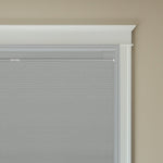Berissa No Drill Top Down Bottom Up Blackout Honeycomb Cellular Shades installed in a window frame.