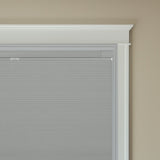 Berissa No Drill Top Down Bottom Up Blackout Honeycomb Cellular Shades installed in a window frame.
