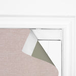 Berissa Simple Colors Uplifting Spaces Premium Linen Roman Shades with soft pink and green colors partially rolled up.
