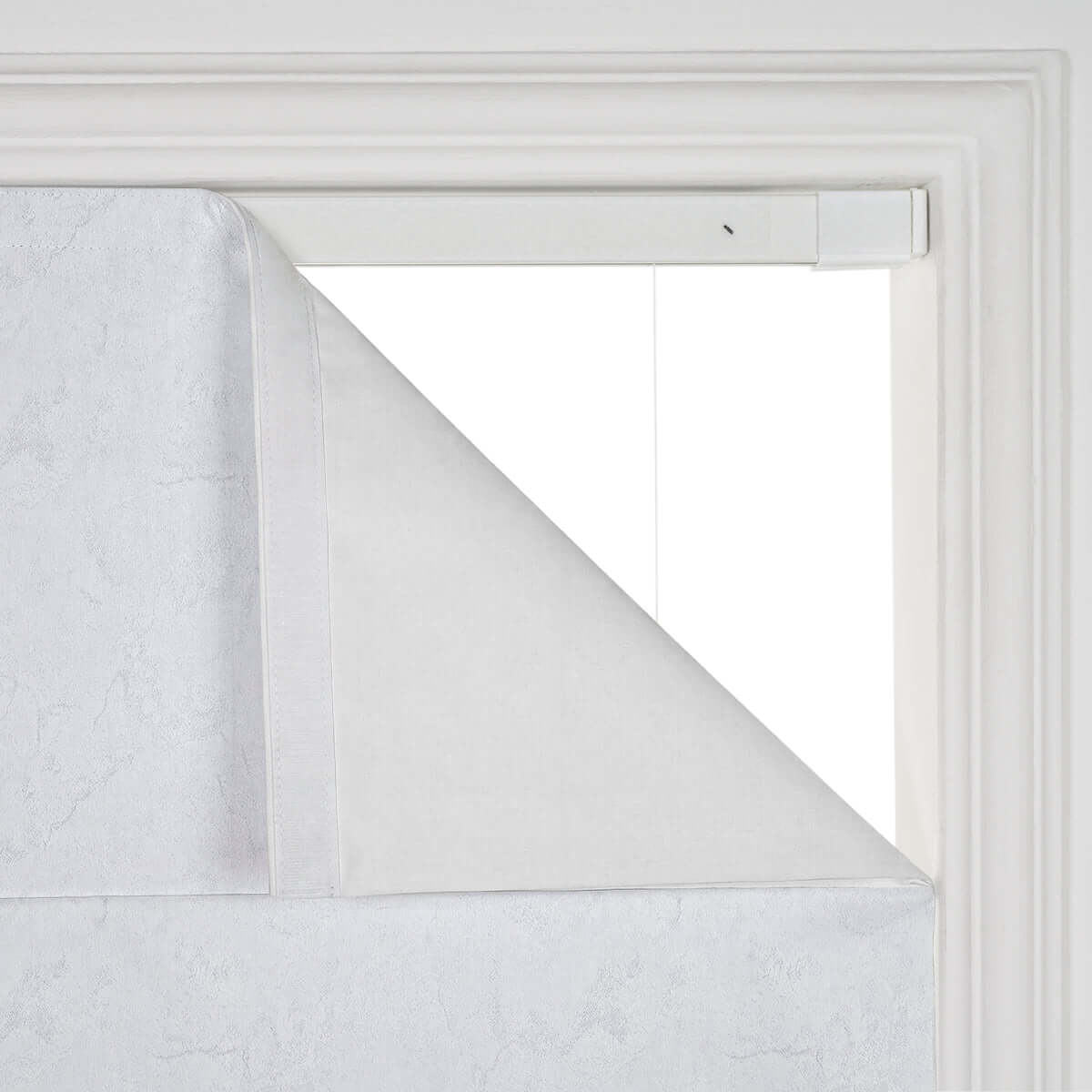Berissa Ice Marble Texture Blackout No Tool Roman Shades installed in a window, showcasing elegant marble texture.