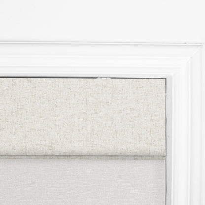 Berissa Custom Blackout and Light Filtering Splicing Motorized Remote Roman Shades in a light fabric design.