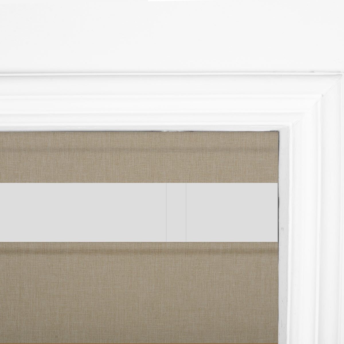 Berissa Motorized Top Down Bottom Up Custom Blackout Roman Shades in elegant beige fabric setting within a white window frame.