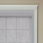 Berissa Easy Install Cordless Spring Roller Blinds installed in a stylish room, showcasing modern design and functionality.