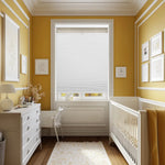 Berissa 1.5 Inch Heat Insulated Top Down Bottom Up Cellular Blinds in a cozy nursery with yellow walls.