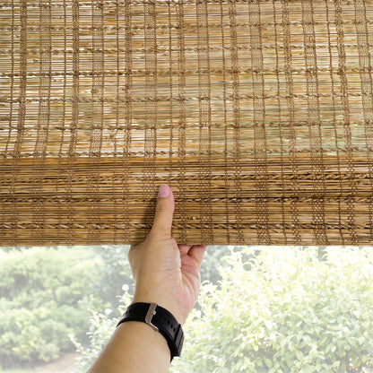 Hand holding Berissa Natural Bamboo Ramie Woven No Drill No Tool Shades, showcasing organic texture and elegance.