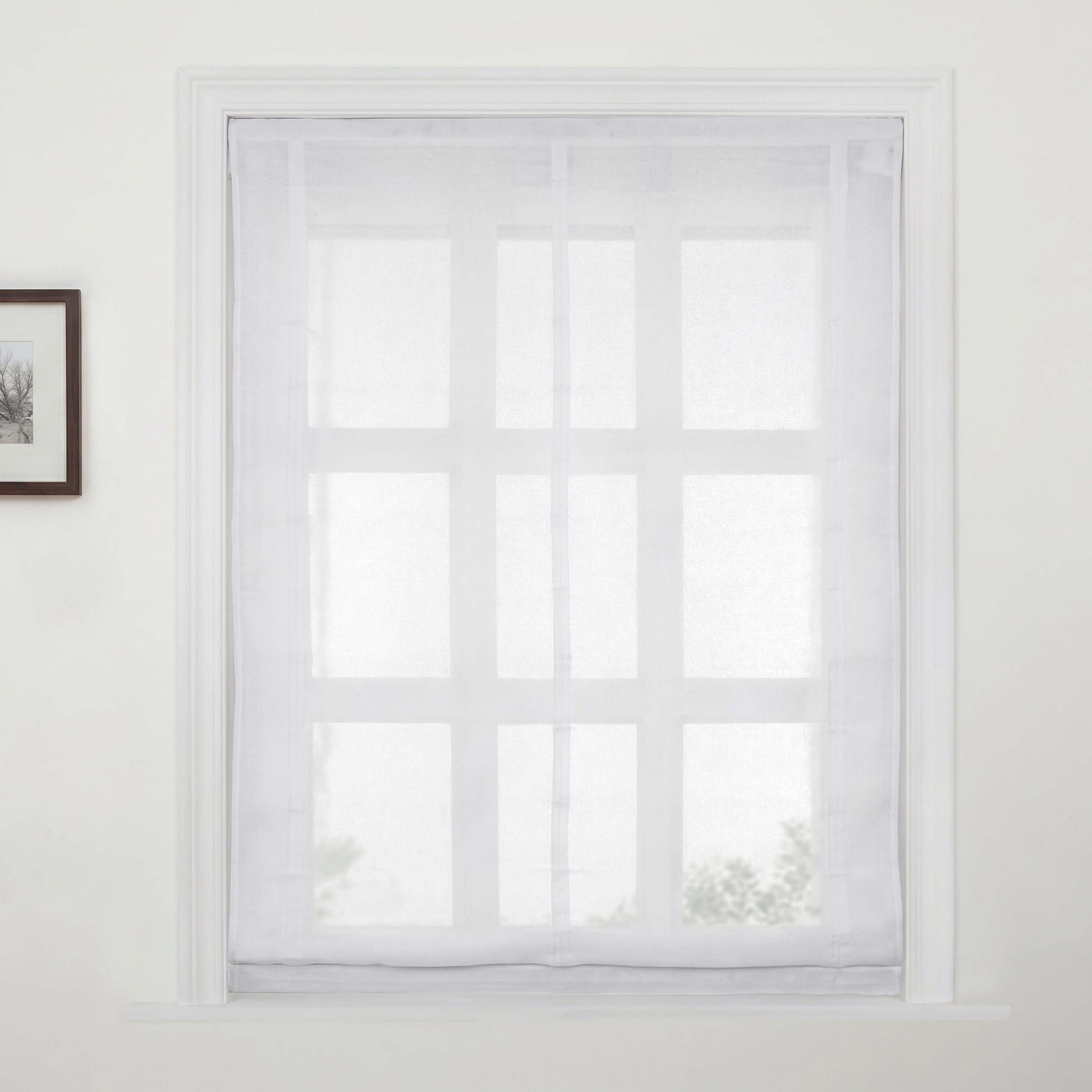 Berissa No Drill No Tool Soft Cotton Custom Relaxed Roman Shade elegantly filtering light in a cozy window.