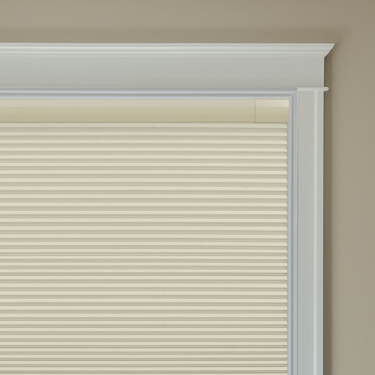 Berissa Budget-Friendly Classic No Drill  Easy-Install Cellular Shades in a light beige color covering a window.