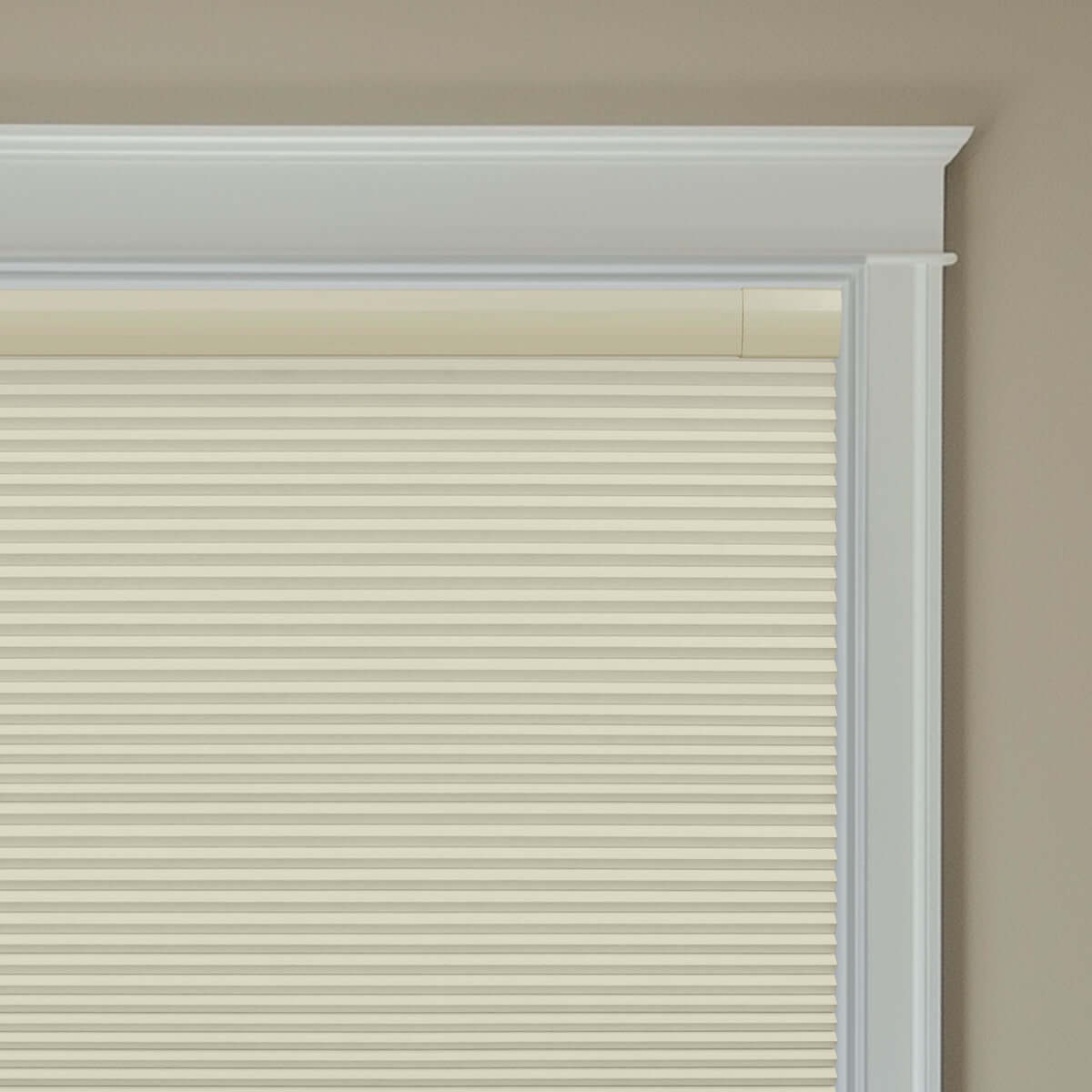 Berissa Budget-Friendly Classic No Drill  Easy-Install Cellular Shades in a light beige color covering a window.