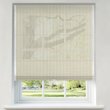 Berissa Light Filtering Imitation Bamboo No Drill Roman Shades displayed in a bright window, allowing soft light to filter through.