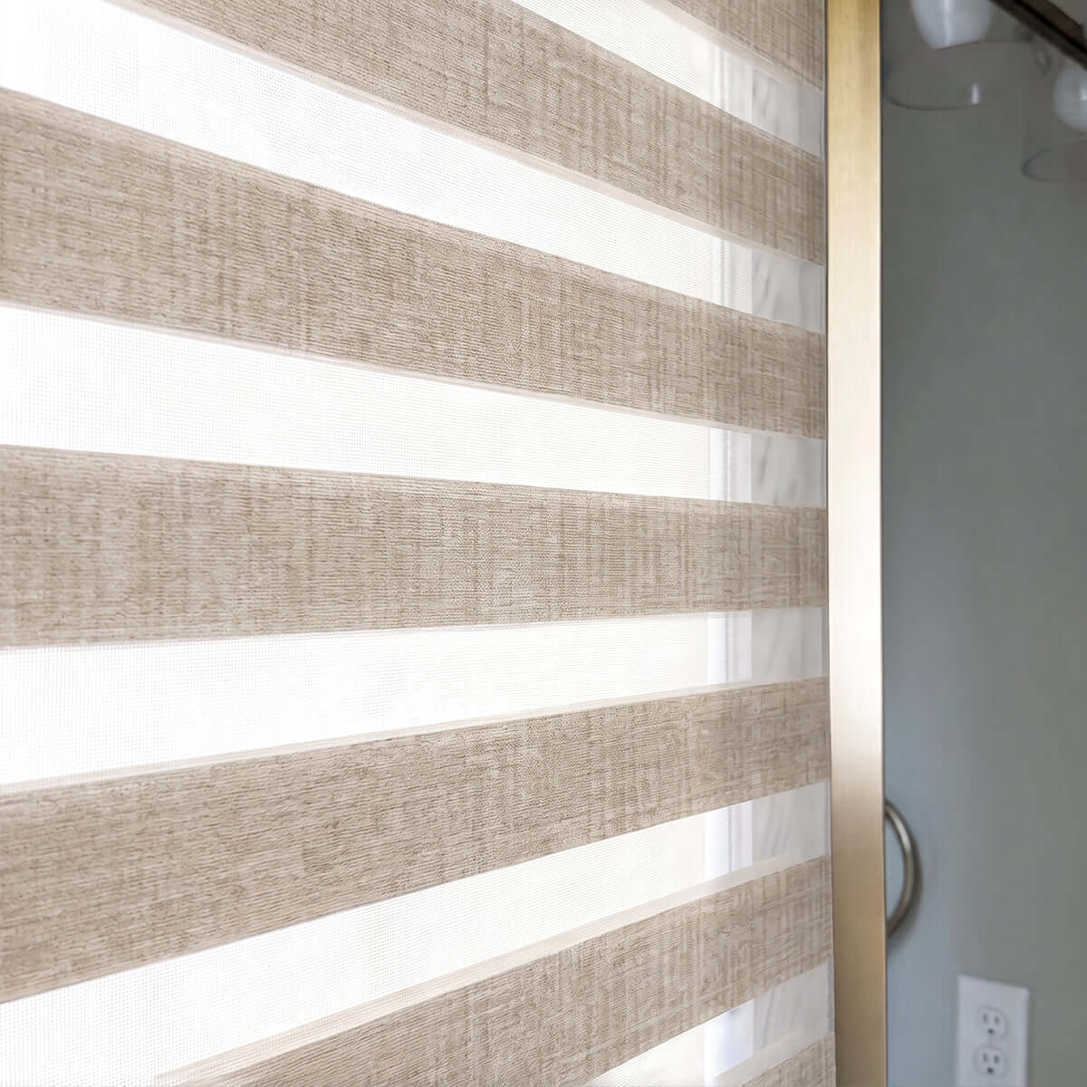 Close-up of Berissa Custom No Drill Zebra Day Night Dual Roller Blind showing warm toned fabric and light control.