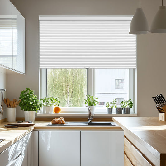 Berissa 1.5 Inch Heat Insulated Cellular Blinds on a kitchen window with natural light and plants.