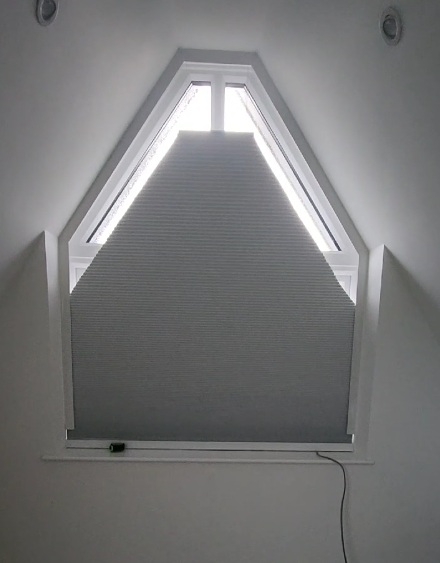 Trapezoidal windows—motorized bidirectional (top-down/bottom-up) operation