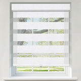 Berissa Day Night Zebra Duo Roller Blind installed in a window, showcasing stylish dual-layer sheer and opaque stripes.