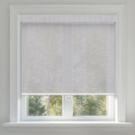Berissa Easy Install Cordless Spring Roller Blinds in a bright window setting with natural light.