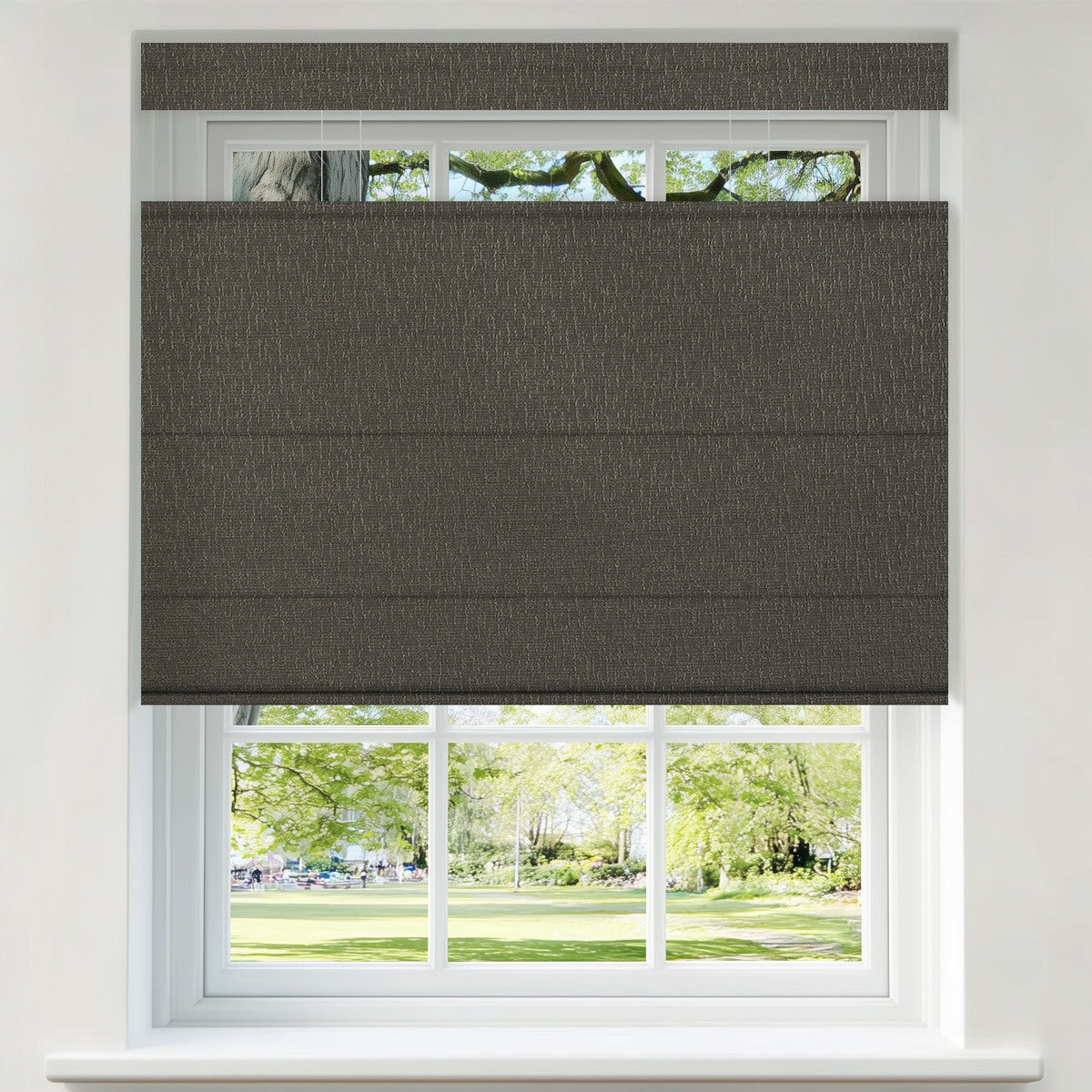 Berissa Linen Look Blackout Flat Fold  Top Down Bottom Up Roman Shade in textured fabric on a window.