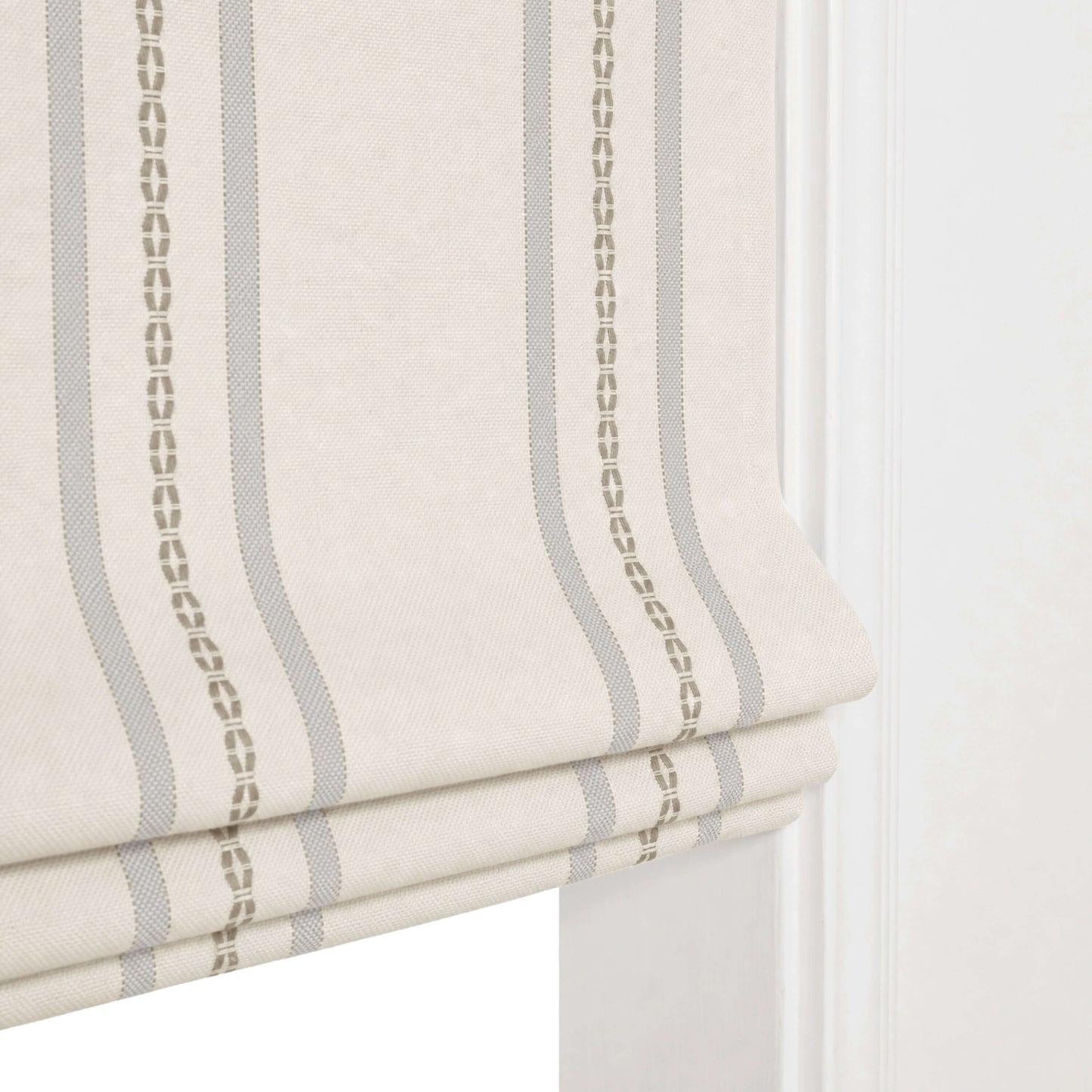 Close-up of Berissa No Tool Cotton Linen Cordless Relaxed Roman Shade with elegant stripes.