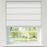 Berissa Custom Textured Blackout No Drill Quick installation Roman Shades installed in a window overlooking greenery.