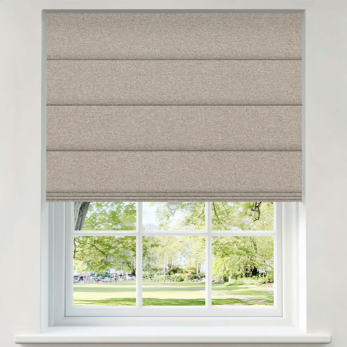 Berissa Vintage Style No-Drill Soft Multiple Colors Roman Shades installed on a window with a view of a park.