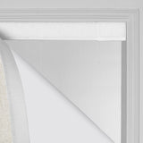 Berissa Obscura & Lumé Linen No Drill Custom Design Roman Shades installation detail showing the fabric and the window frame.