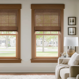 Berissa Cordless Light Filtering  Bamboo Roman Shades installed in modern living room window.