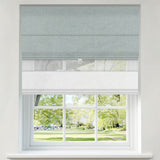 Beeissa Cordless Double Shades Blackout and Semi View White Day Night Roman Shades in a window view.