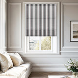 Berissa Candy Square Stripe Custom Roman Shades in a stylish living room setting with gray striped pattern.